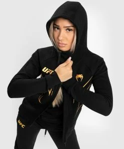UFC Venum Fight Night 2.0 Replica Women's Full Zip Hoodie - Champion 13 UFC Venum Fight Night 2.0 Replica Women's Full Zip Hoodie - Champion -Boxing Elegant Butikk 3 252F5 252F6 252Fc 252F356c1d8da37cd2a0067e8e9b001ef8fcd2c3e8e4 VNMUFC 00151 126 07
