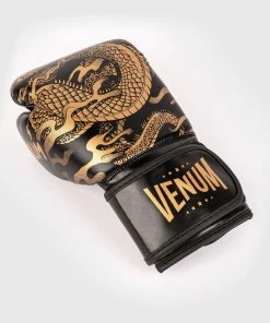 Venum Dragon's Flight Boxing Gloves - For Kids - Black/Bronze -Boxing Elegant Butikk 8 252Fb 252Fa 252F7 252F8ba70d01b6a123ba2a9415963f407407d3b35660 BG DRAGONSFLIGHT BLACK GOLD 05 ec889ff1 87de 4d40 a3ce f645bd779a80
