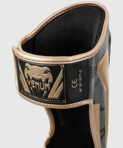 Venum Elite Shin Guards - Dark Camo/Gold -Boxing Elegant Butikk SHINGUARD ELITE 3.0 BLACK GOLD 1500 04 2