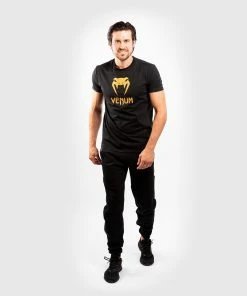 Venum Classic T-shirt - Black/Gold -Boxing Elegant Butikk b 252F6 252F7 252Fd 252Fb67d3e873404886714a09e2feb803726275b626a TS CLASSICS BLACK GOLD 08